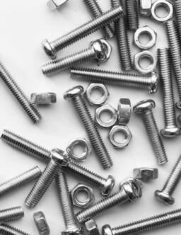 Nuts / Bolts / Screws closeup on white background